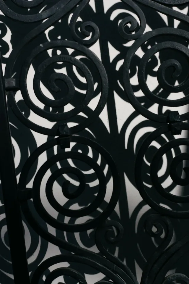 Detail of a wrought iron gate, interlacing spiral pattern
